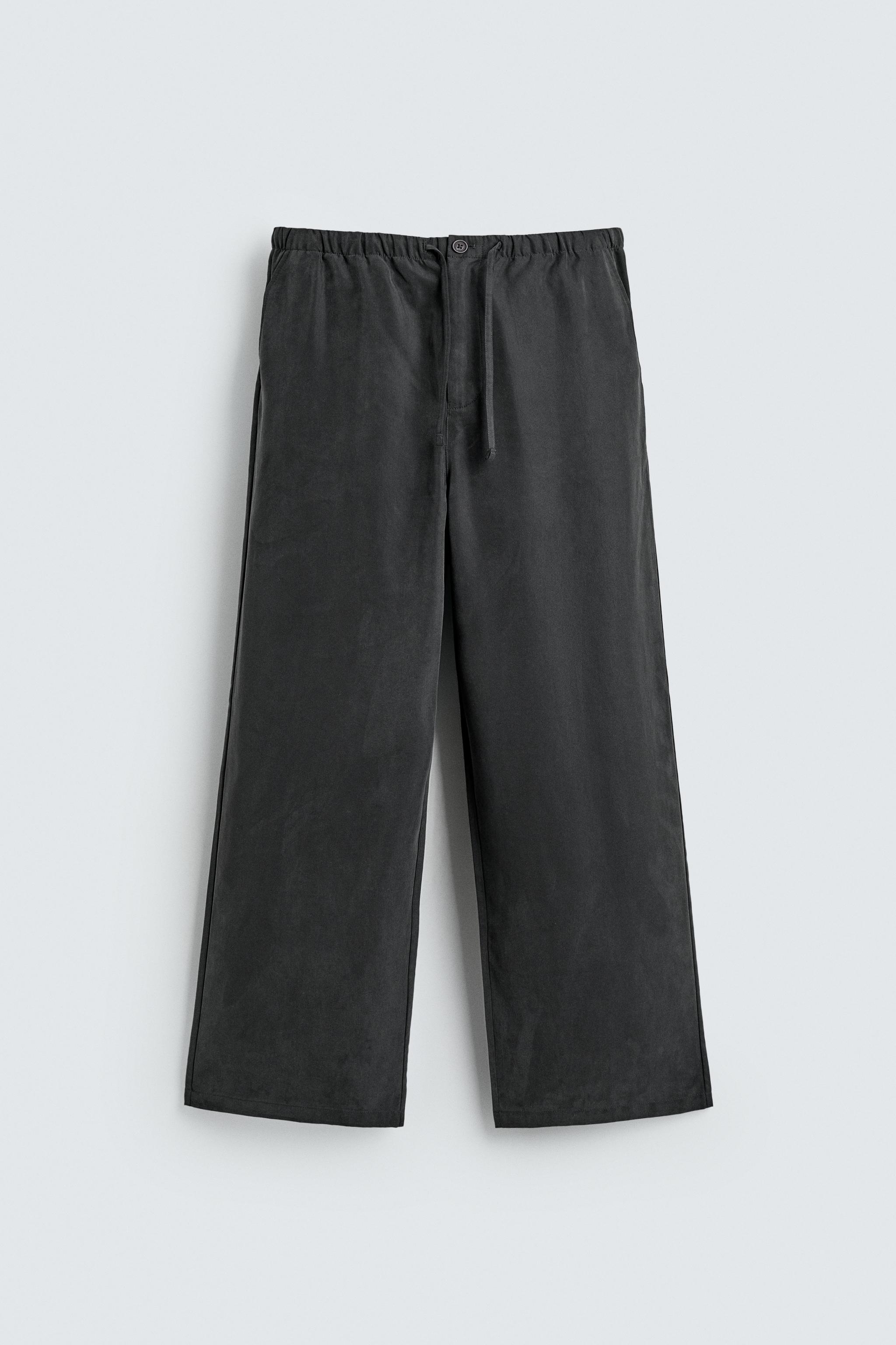 RELAXED FIT FLOWY PANTS